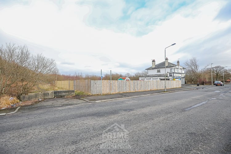 Main view of property at Land next to 124 Blackstoun Road, Paisley, PA3 1EX